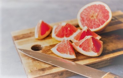 grapefruit slices on cutting board